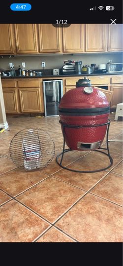 30 inch -tall -Kamari Joe-potable charcoal grill +sear plate with cast iron cart and heat deflection and heat maintenance temperature