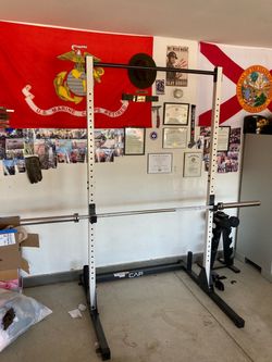 Squat rack/Bench press/weights