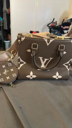 Bolsa de colgar LV usada casi nueva
