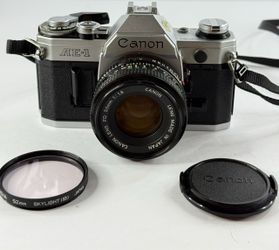 Canon AE-1 Silver 35mm SLR Film Camera + FD 50mm f/1.8 Lens Tested