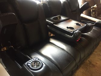 Black Leather Couch, with Electronic Reclining touchpad, Cupholders, Usb ports, and Arm cabinets
