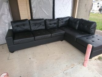 Black leather Sofa.. 2 pc