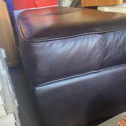 Padded dark brown bench with storage