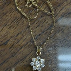 14k chain with 1.65 carat pendant center stone .60 sorrounding.15 each stone pick up only!!