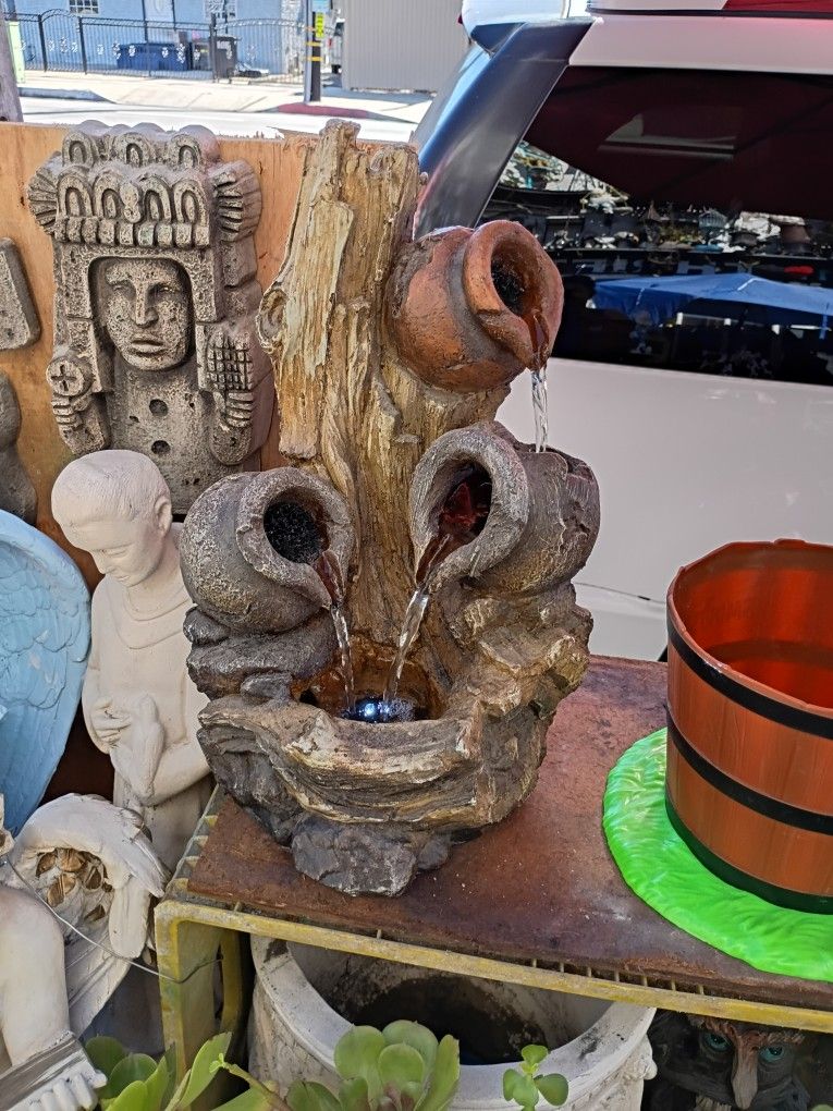 Fountain ⛲ Beautiful Design Of Rockwood And Logs And Bases