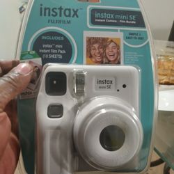 Brand New Camera Still In The Pack Come With The Batteries And The Films