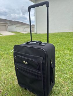 Black carry-on suitcase 20 x 13.5 x 8 for sale /