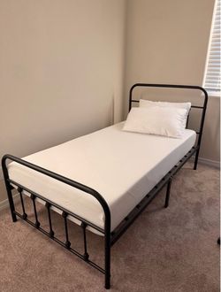 Twin bed frame with mattress