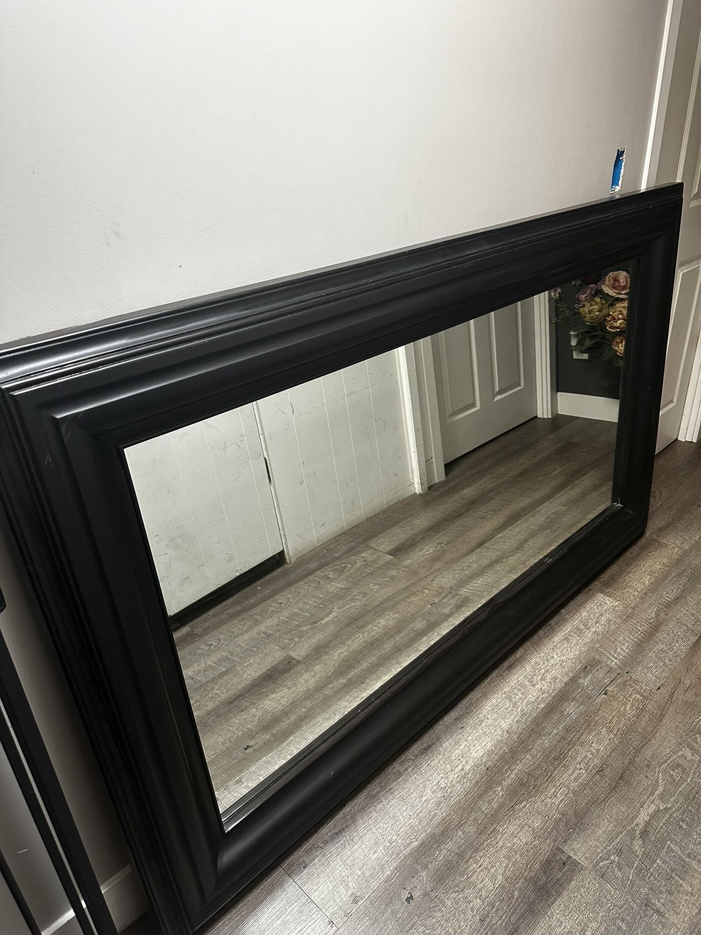 black miorr with wood on the side