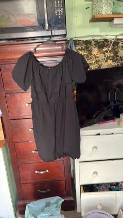 LOWERED AGAIN.      Woman’s large black sundress