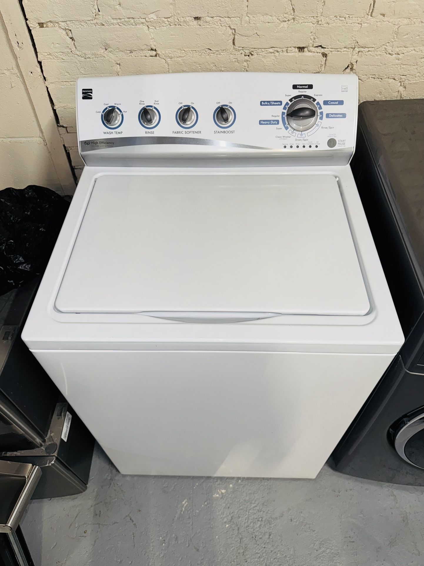 Kenmore washing machine, a receipt for a 60-day warranty