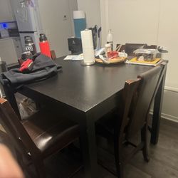 Table And 4 Chairs 