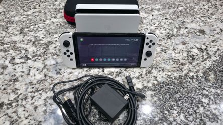 Nintendo Switch Oled with 4 Games