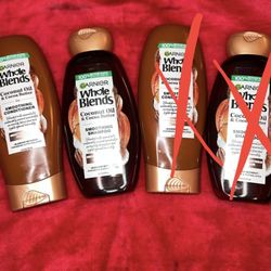 Garnier Whole Blends Coconut Oil & Cocoa Butter Smoothing Shampoo and Conditioner in 12.5 fl oz (370 ml) bottles.  Key features include: Purpose: The 