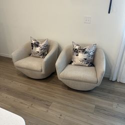 2 Swivel Accent Chairs 