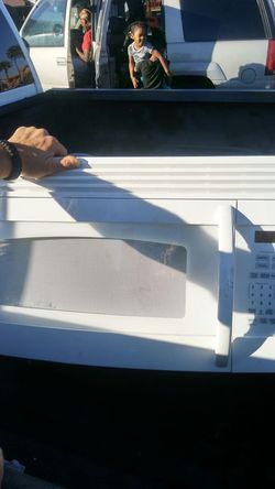 GE microwave model jvm154dm4ww