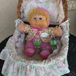 Cabbage Patch Kid In Rattan Doll Bed 