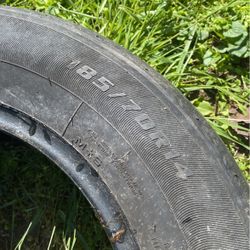 Used Tire 185/70R14, $8