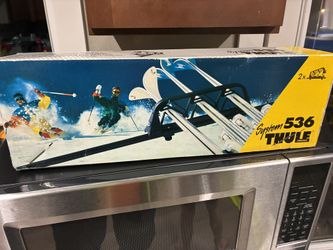Thule System 536 ski rack. ( roof-mounted carrier )