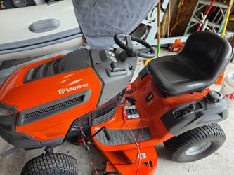 Huskivarna lawn tractor with dump cart