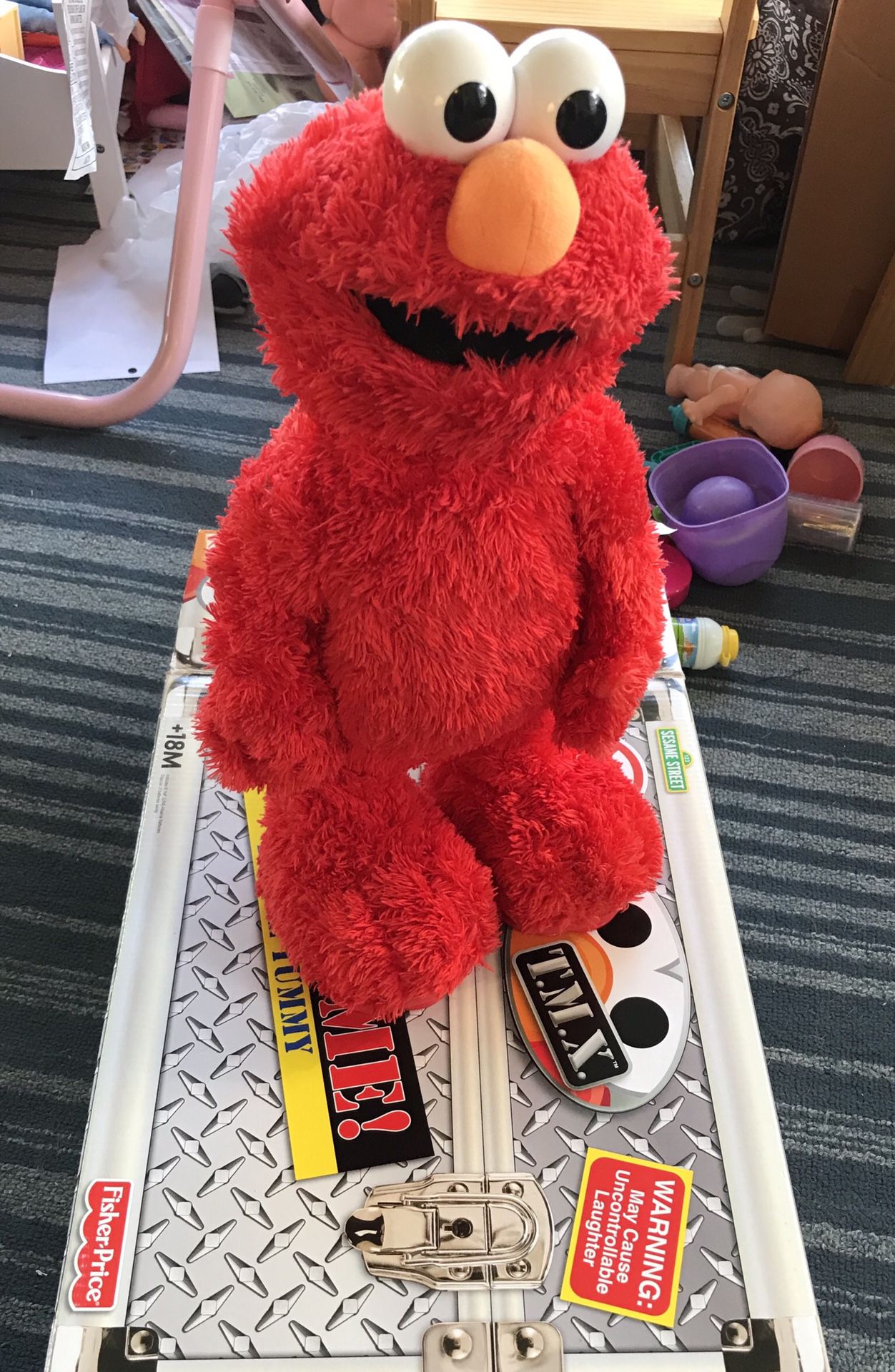 Tickle me Elmo T.M.X works great kept in box
