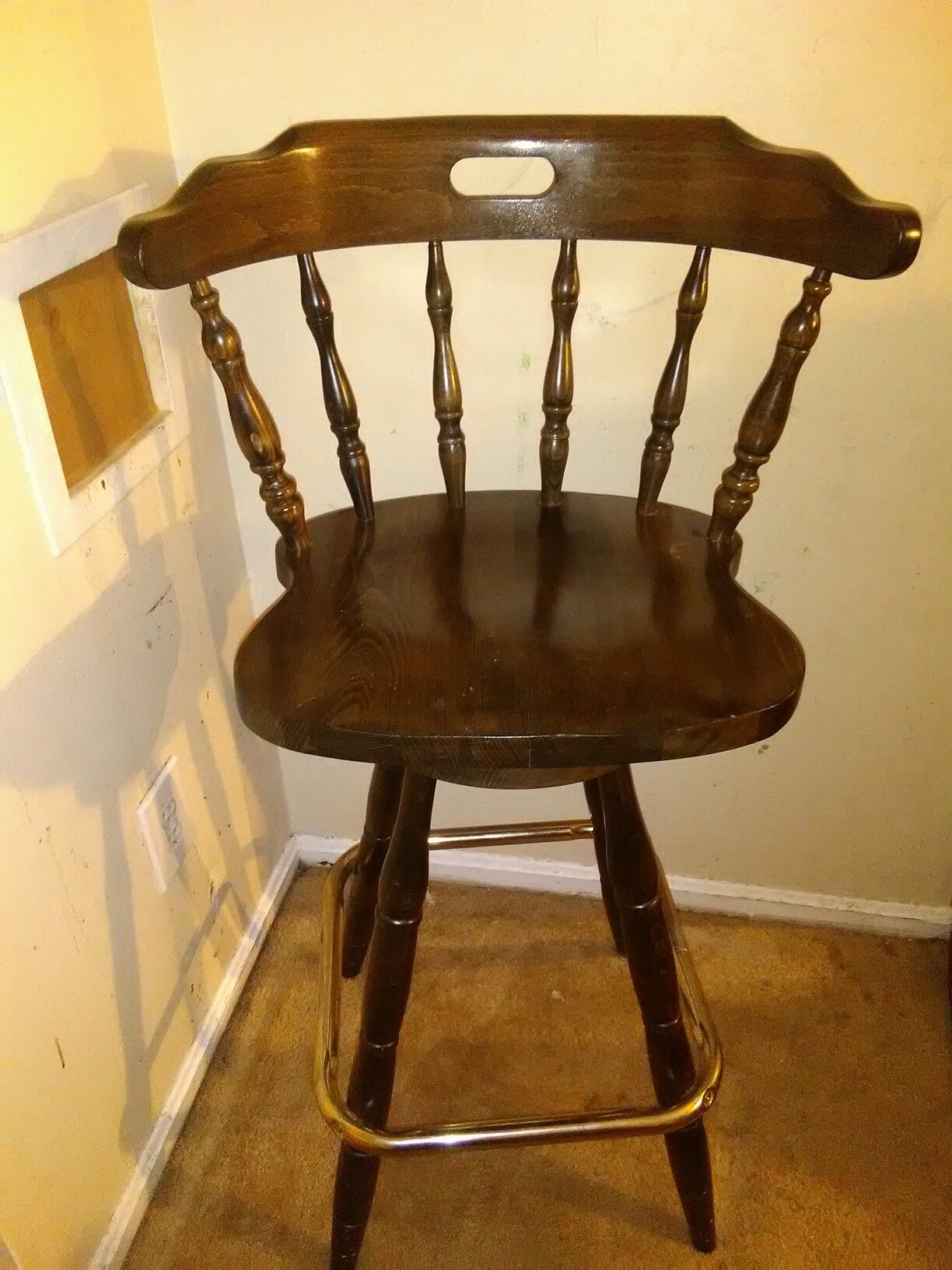 Antique wooden swivel chair