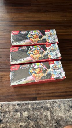 Prismatic evolutions surprise box Sealed