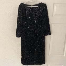 A very unique Black velvet dress with sequins 