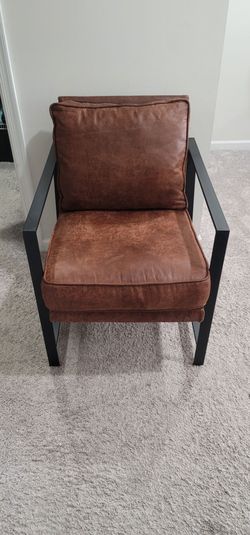 Brown faux leather accent chair