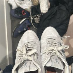 Louis Vuitton Run Away Sneakers in white.
