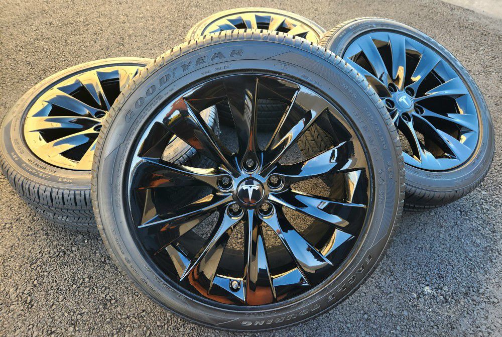 19” Tesla Model S gloss black wheels and tires 
