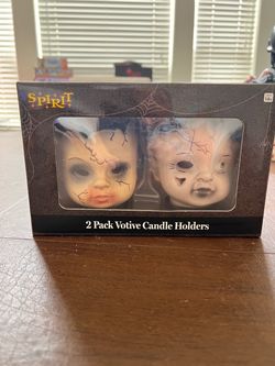 New in box spirit Halloween doll head votives
