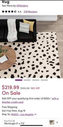 Cream And Black Animal Print Rug $50 size is 5x 7ft