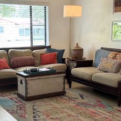2 Bernhardt sofas from the Martha Stewart collection in walnut and rattan frame