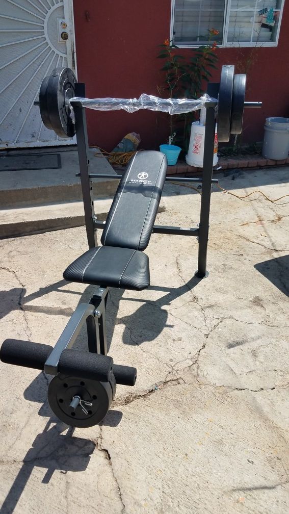 Standard with bench press with bar and 100lb weight set ...