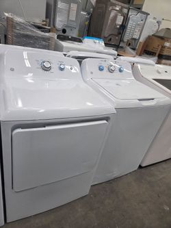 GE  top load washer and gas dryer white new