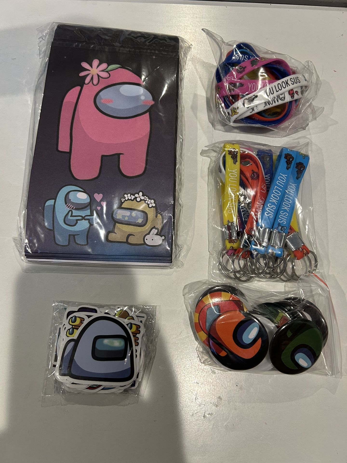 Among us party decorations (candy bag,bracelet,keychain,pins and stickers)