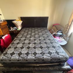 Queen Mattress with Dark Wood Bed Frame
