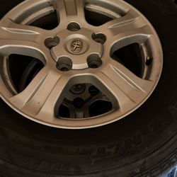 wheels and tires for toyota tundra 5 lugs good condition 75% good 