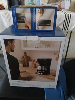 Coffee maker with grinder