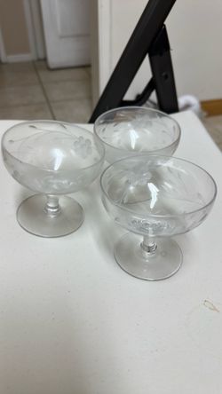 Three etched with flowers, champagne, glasses