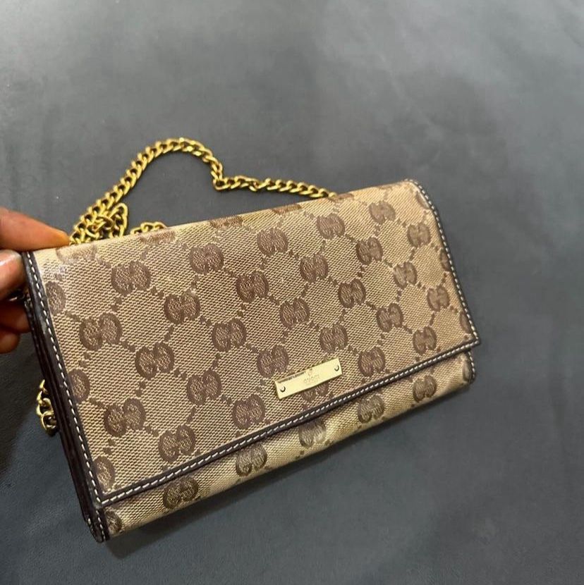Pre Owed Authentic Gucci Brown With dark Brown With Dark Leather Wallet With Gold Strap