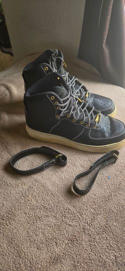 Black High-Top Sneakers with Gold Eyelets