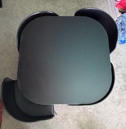 Table with 4 chairs.