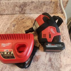 New Milwaukee M12 with battery and charger firm price