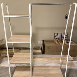 Clothing organizer rack with shelves