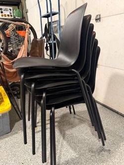 Black Molded Stacking Chairs - $20 Each, 6 Available