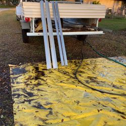 (2) pieces of 3”x3”x1/4” x 6’4” long aluminum angle and (2) pieces of stainlesss steel 2”x2”x 1/16” x 6’ long