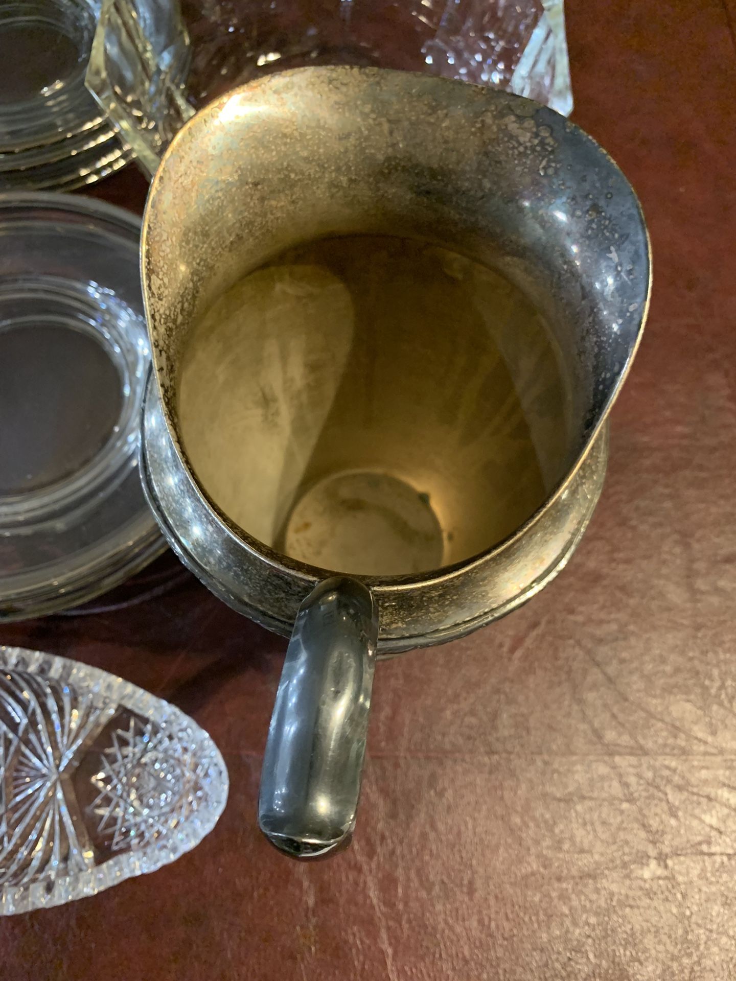 Fostoria 7 Crystal Trays, 8 Silver Plated Plates, 1 Silver Plated Fruit Bowl, (1 Silver Plated Pitcher Evandale WM Roger’s)