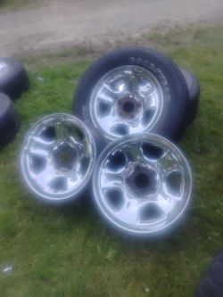 Wheels (4) Chrome steel 5 lug Dodge wheels and tires (2) Goodyear Eagle.  Accepting offers.